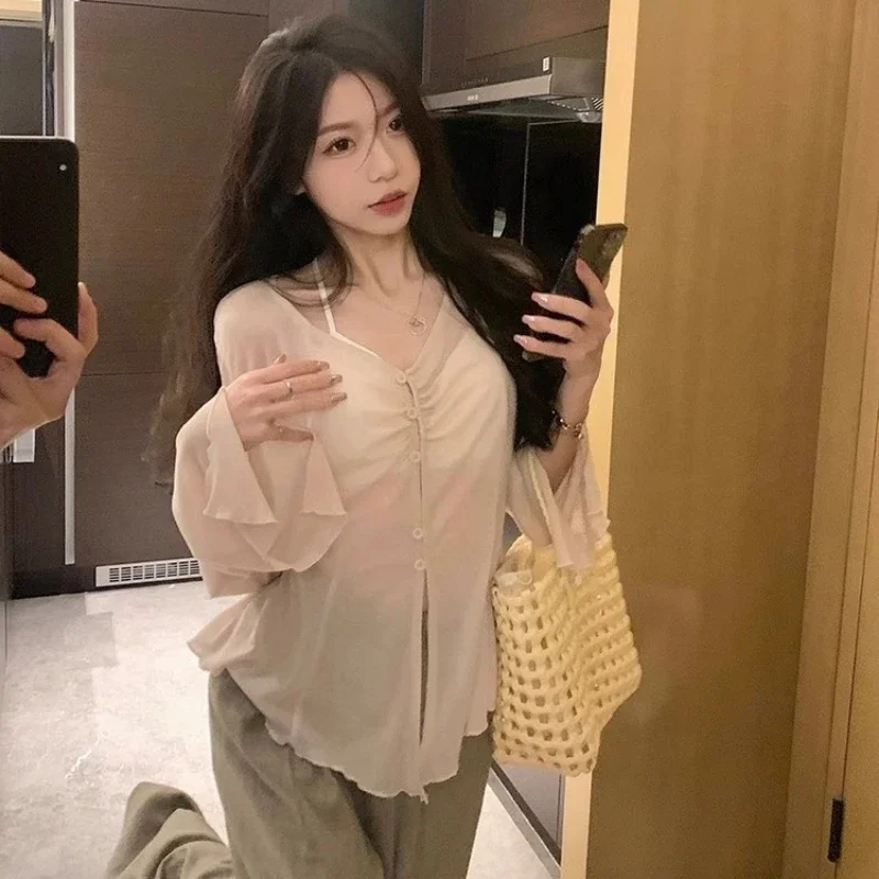Blouses - Blusa con mangas acampanadas transparentes -